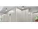 The hallway is well lit and features white walls, doors, and trim at 7017 S Providence Rd, Waxhaw, NC 28173