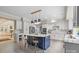 Stylish kitchen with a center island, bar stool seating, stainless steel appliances, and recessed lighting at 7017 S Providence Rd, Waxhaw, NC 28173