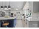 Well-appointed kitchen with stainless steel appliances, a center island, and elegant finishes at 7017 S Providence Rd, Waxhaw, NC 28173