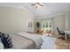 Primary bedroom featuring natural light, a ceiling fan and hard wood flooring at 7017 S Providence Rd, Waxhaw, NC 28173