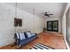 Cozy screened-in porch with brick flooring, comfortable seating, and a ceiling fan at 7017 S Providence Rd, Waxhaw, NC 28173