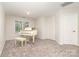 Bonus room with carpet flooring, natural light, and white piano at 7031 Walton Heath Ln, Charlotte, NC 28277