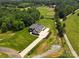 A gorgeous aerial view of a home, demonstrating the beautiful lawn and surrounding land at 867 Bellegray Rd, Clover, SC 29710