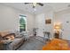 Inviting bedroom featuring a workspace, a cozy chair, and natural light at 867 Bellegray Rd, Clover, SC 29710