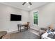 Comfortable bedroom featuring a TV, a desk, and a cozy chair at 867 Bellegray Rd, Clover, SC 29710