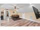 Spacious bonus room with hardwood floors and comfortable seating area at 867 Bellegray Rd, Clover, SC 29710