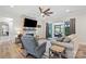 Bright living room featuring a stone fireplace and sliding doors to a patio at 867 Bellegray Rd, Clover, SC 29710