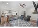 Open-concept living room with updated kitchen and luxury vinyl flooring at 867 Bellegray Rd, Clover, SC 29710