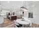 Open-concept living space connecting the kitchen, dining area, and living room, perfect for entertaining at 867 Bellegray Rd, Clover, SC 29710