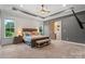 Large main bedroom offers a comfortable retreat with views of nature at 867 Bellegray Rd, Clover, SC 29710