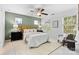 Bright bedroom with large windows, ceiling fan and neutral decor at 10027 Juniper Trace Dr, Charlotte, NC 28277