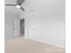 Bright bedroom with a ceiling fan and ample closet space at 10027 Juniper Trace Dr, Charlotte, NC 28277