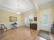 Formal dining room with wood floors, wainscoting, and ample natural light at 1004 Fairbanks Ct, Indian Trail, NC 28079