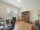 Home office featuring a large desk, comfortable chair, and ample storage at 1004 Fairbanks Ct, Indian Trail, NC 28079