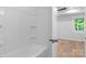 Bathroom with shower and tub combo and a window for natural light at 101 Churchill Dr, Kings Mountain, NC 28086