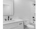 Bathroom featuring a sink with black fixtures, and a toilet and shower with white tiling at 101 Churchill Dr, Kings Mountain, NC 28086