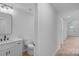 Bathroom featuring a sink with black fixtures, and a toilet at 101 Churchill Dr, Kings Mountain, NC 28086