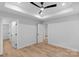 A bright bedroom with modern fan, recessed lighting, and light hardwood floors at 101 Churchill Dr, Kings Mountain, NC 28086
