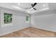 Bright bedroom with a ceiling fan and views out of the windows at 101 Churchill Dr, Kings Mountain, NC 28086