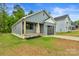 Charming single-Gathering home featuring gray siding, an attached garage, and a well-manicured lawn at 101 Churchill Dr, Kings Mountain, NC 28086