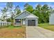 Single-Gathering home featuring gray siding, attached garage, and front yard at 101 Churchill Dr, Kings Mountain, NC 28086