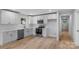 Modern kitchen featuring white cabinets, stainless steel appliances, and subway tile backsplash at 101 Churchill Dr, Kings Mountain, NC 28086