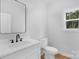 Modern bathroom with a sleek vanity, black fixtures, and natural light at 103 Churchill Dr, Kings Mountain, NC 28086