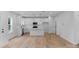Modern kitchen with white cabinets, stainless steel appliances, and a large island, perfect for entertaining at 103 Churchill Dr, Kings Mountain, NC 28086