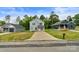 Newly built homes line a quiet street, featuring modern designs and well-maintained lawns at 103 Churchill Dr, Kings Mountain, NC 28086