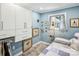 Cozy bedroom with ample natural light, a built-in wardrobe, and a charming window view at 106 Phifer St, Fort Mill, SC 29715