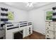 Bright bedroom featuring a unique loft bed with built-in storage and hardwood floors at 106 Phifer St, Fort Mill, SC 29715