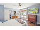 Bright bedroom featuring a walk-in closet, ceiling fan and desk near the window at 106 Phifer St, Fort Mill, SC 29715