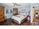 Cozy bedroom with blue walls, hardwood floors, and unique decor elements at 106 Phifer St, Fort Mill, SC 29715