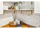 Kitchen shelving displaying charming decor, with elegant glassware and bright lighting at 106 Phifer St, Fort Mill, SC 29715
