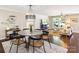 Open living space with dining area, comfortable seating, stylish decor, and natural light creating an inviting atmosphere at 106 Phifer St, Fort Mill, SC 29715