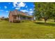 Spacious backyard with lush green lawn, perfect for outdoor activities and enjoying the natural surroundings at 1070 Blueberry Rd, Salisbury, NC 28147