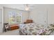 Charming bedroom featuring a floral bedspread, window with blinds, and a wooden chest for ample storage at 1070 Blueberry Rd, Salisbury, NC 28147