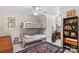 Cozy bedroom with bunk beds, ceiling fan and a colorful rug, perfect for or guests at 1070 Blueberry Rd, Salisbury, NC 28147