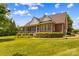 Beautiful brick home with a screened porch and well-manicured lawn at 1070 Blueberry Rd, Salisbury, NC 28147