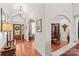 Stunning foyer with hardwood floors, an arched entryway, and glass paneled door at 1070 Blueberry Rd, Salisbury, NC 28147