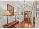 Elegant foyer with hardwood floors, arched entryways, and decorative lighting at 1070 Blueberry Rd, Salisbury, NC 28147