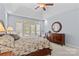Inviting main bedroom with tray ceiling, private balcony access, and a serene atmosphere at 1070 Blueberry Rd, Salisbury, NC 28147