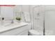 Bright bathroom features a walk-in shower, white vanity, and neutral decor at 11131 Cardinal Creek Ave, Charlotte, NC 28215