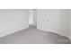 This is a bedroom with neutral carpet, white walls and trim, and white doors at 11131 Cardinal Creek Ave, Charlotte, NC 28215
