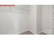 Walk-in closet with shelving and carpeted floors, providing organized storage space at 11131 Cardinal Creek Ave, Charlotte, NC 28215