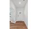 Bright entryway featuring wood flooring and a white front door with sidelights at 11131 Cardinal Creek Ave, Charlotte, NC 28215
