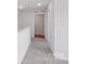 Upstairs hallway with neutral walls, carpet, and recessed lighting at 11131 Cardinal Creek Ave, Charlotte, NC 28215