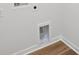 Close-up view of hook-ups for laundry in a clean laundry room at 11131 Cardinal Creek Ave, Charlotte, NC 28215