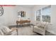 Stylish home office features a modern desk, comfortable seating, natural light, and neutral decor at 11131 Cardinal Creek Ave, Charlotte, NC 28215