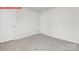 Neutral room with wall-to-wall carpet and white walls at 11131 Cardinal Creek Ave, Charlotte, NC 28215
